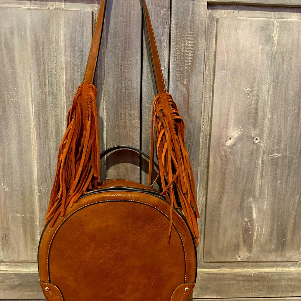 Brown fringe mountain bag.
